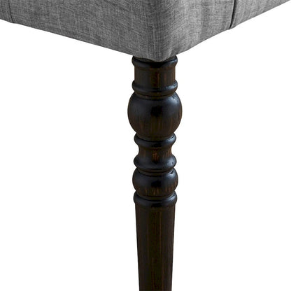 Panca da pranzo con gambe tornite e trapuntate in tessuto