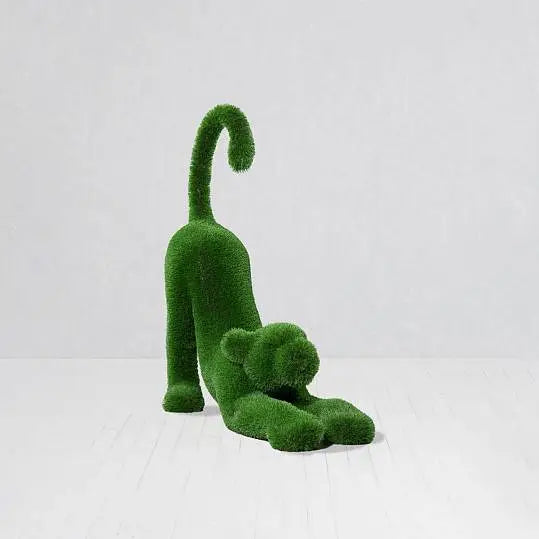 Topiaria di leone bambino in erba