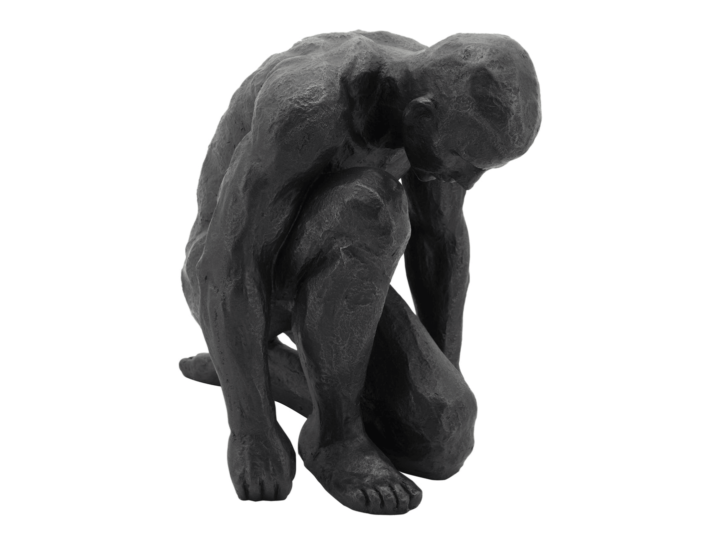 La scultura dell'uomo inginocchiato