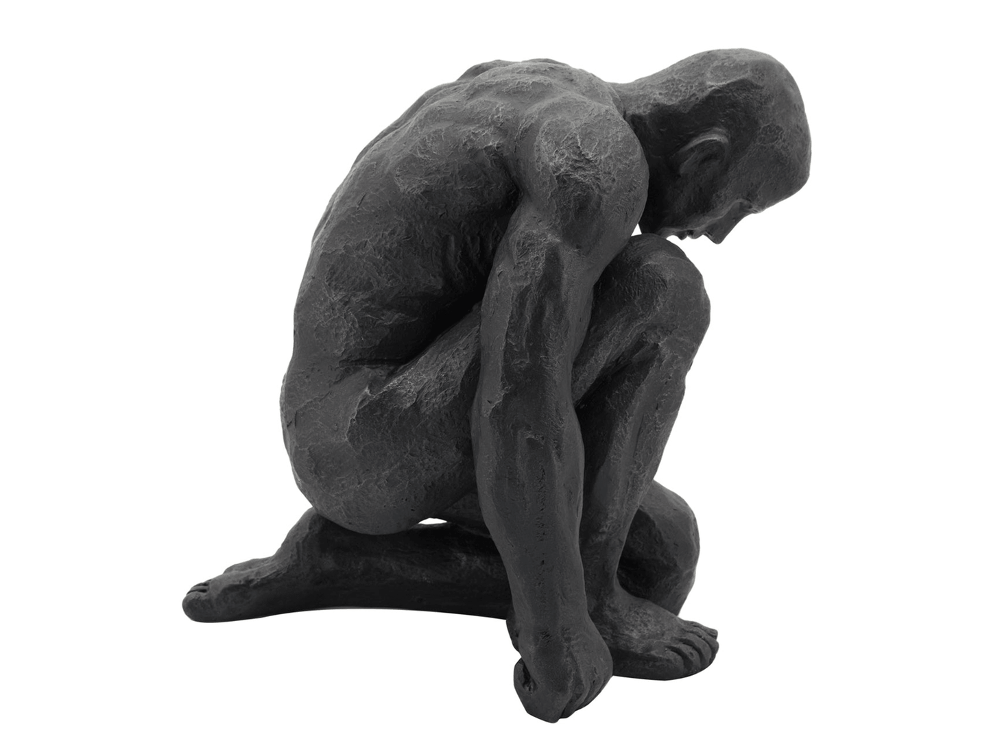 La scultura dell'uomo inginocchiato